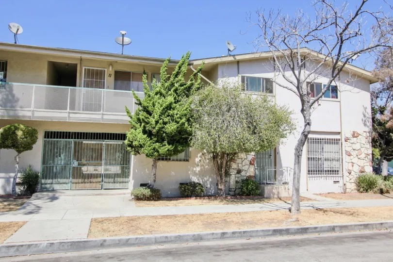 The sidewalk in front of Lynn Manor in Long Beach, California