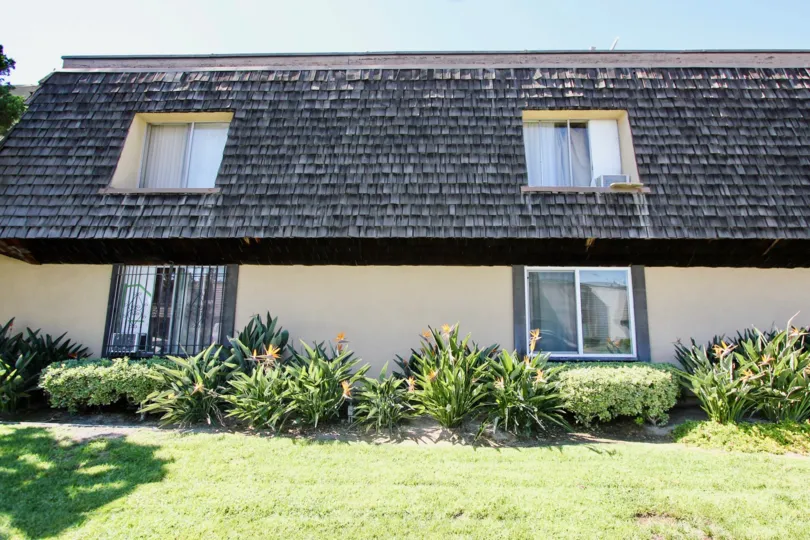 The plants in front of New England Manor in Long Beach, California