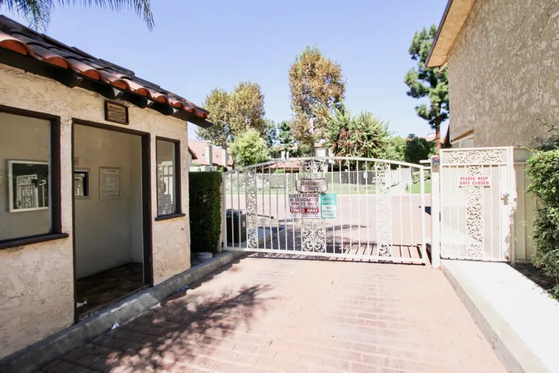 The gate into Village Grove in Long Beach, California