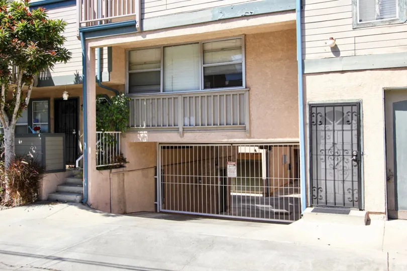 The gate for parking at Walnut Ave Villas in Long Beach, California