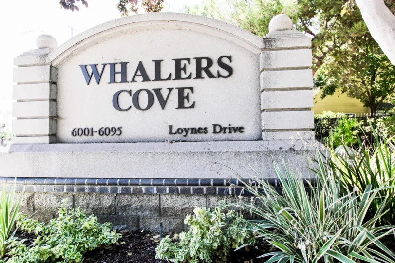 The Whalers Cove name on the sign