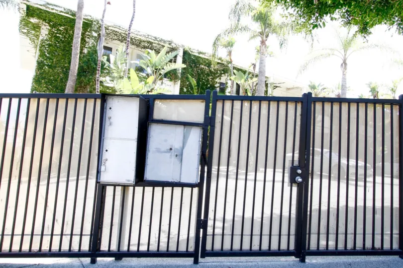 The parking on the other side of the fence in Holiday House