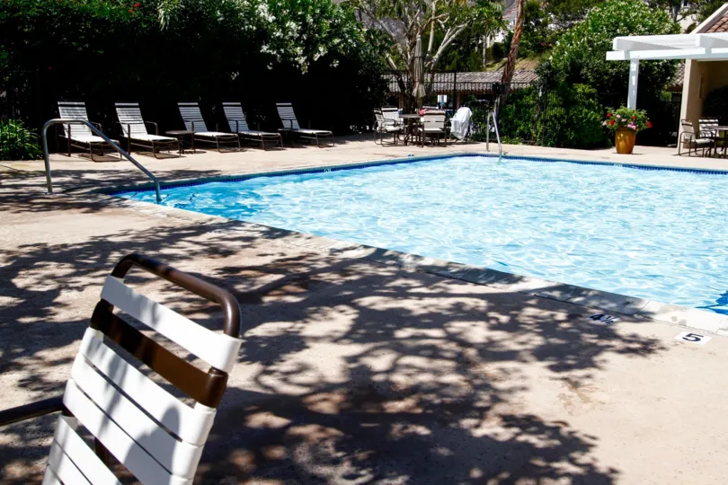 The patio around the pool at Maison De Ville