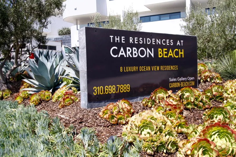 The sign annoucning Residences at Carbon Beach in CA California