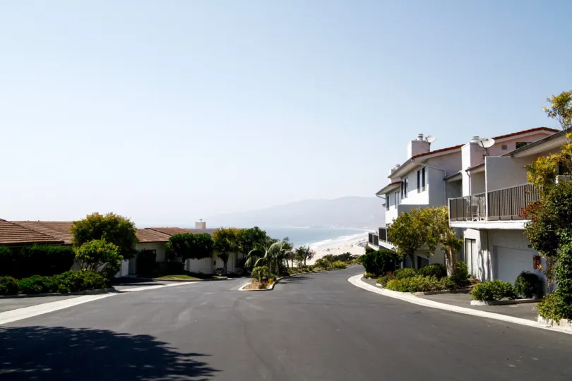The drive into Zuma Bay Villas in CA California