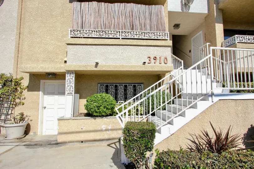 The stairs leading up to 3910 Moore St