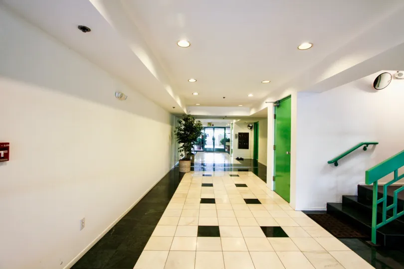 The hallway inside of Avon Way Condominiums