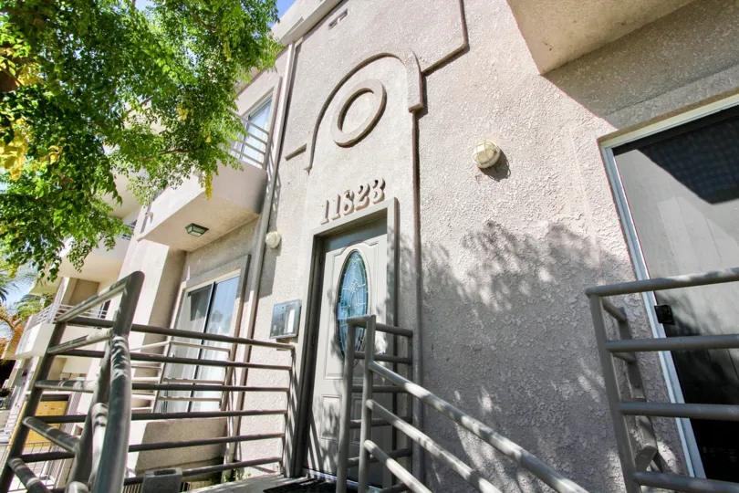 The address for Avon Way Townhomes above the entrance