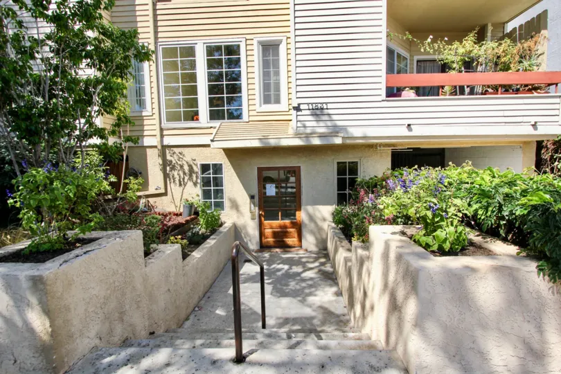 The stairs leading down to the entrance into Courtleigh Condos
