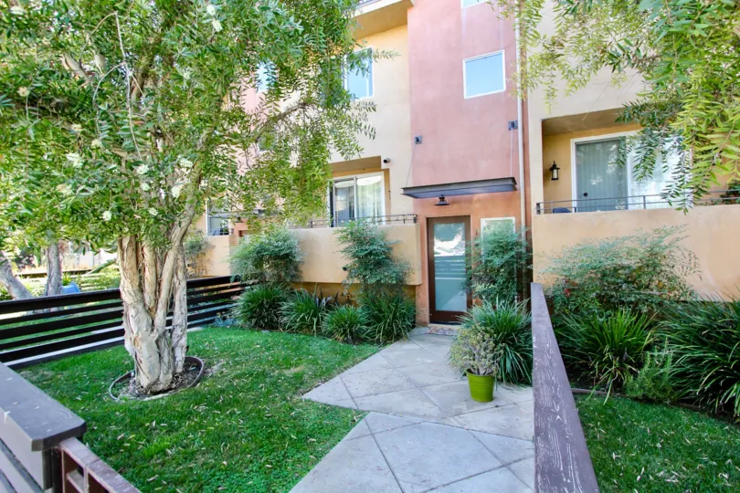 The yard to the side of Moore Street Townhomes