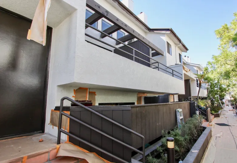 The fence for privacy around Pacific Breeze II
