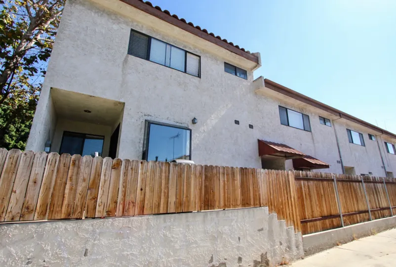 The privacy fence around Venice Blvd Townhomes