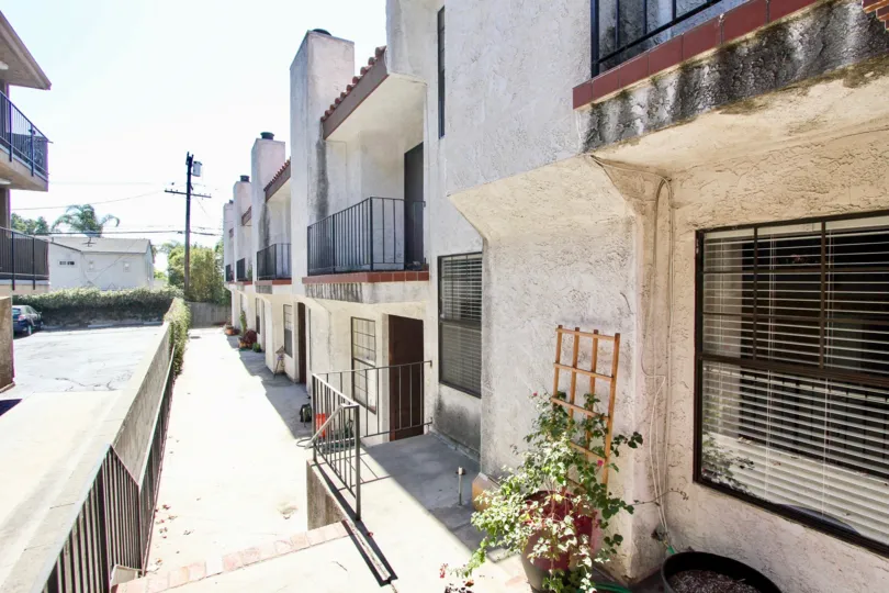 The sidewalk in front of Venice Blvd Townhomes