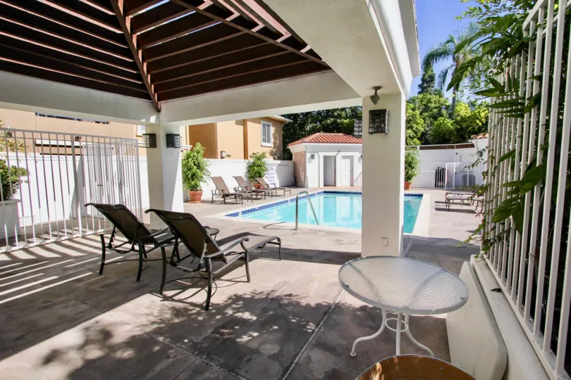 The lounge chairs around the pool at Westdale Village