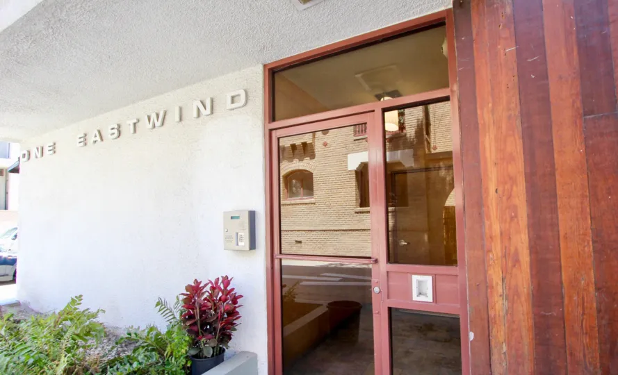 The wooden door in 1 eastwind of marina del ray that should has the glass design.