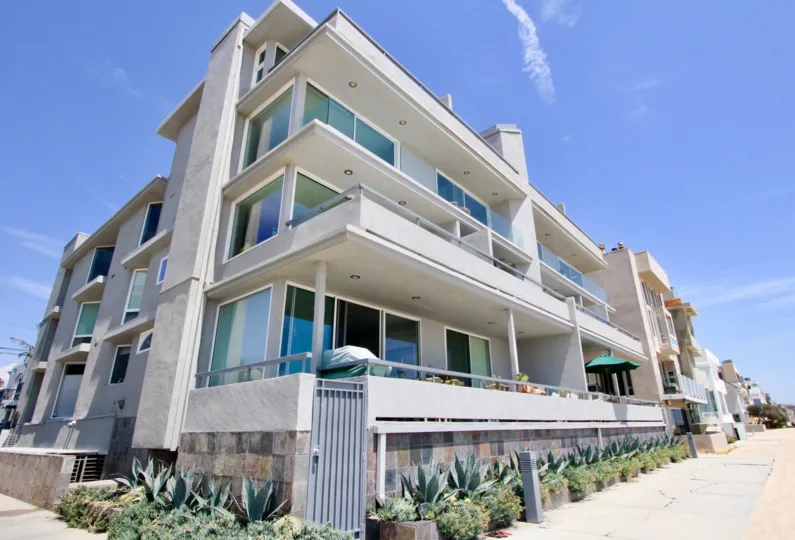 The sunny open sky over well lit balconies along the sidewalk at 6 Fleet in Marina Del Rey.
