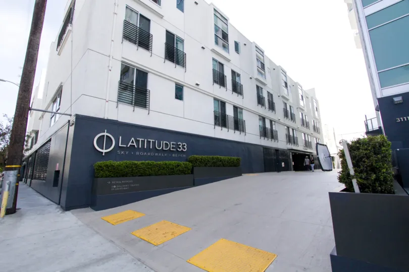 The drive in front of Latitude 33 Beach Collection
