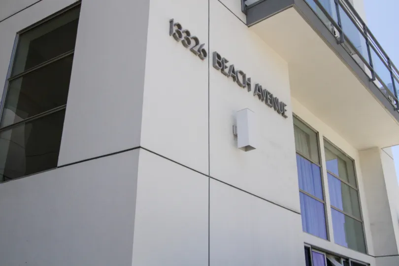 The name Lofts On Beach Avenue placed on the building