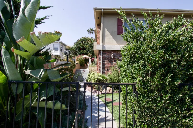 The gate into 11585 Riverside Dr