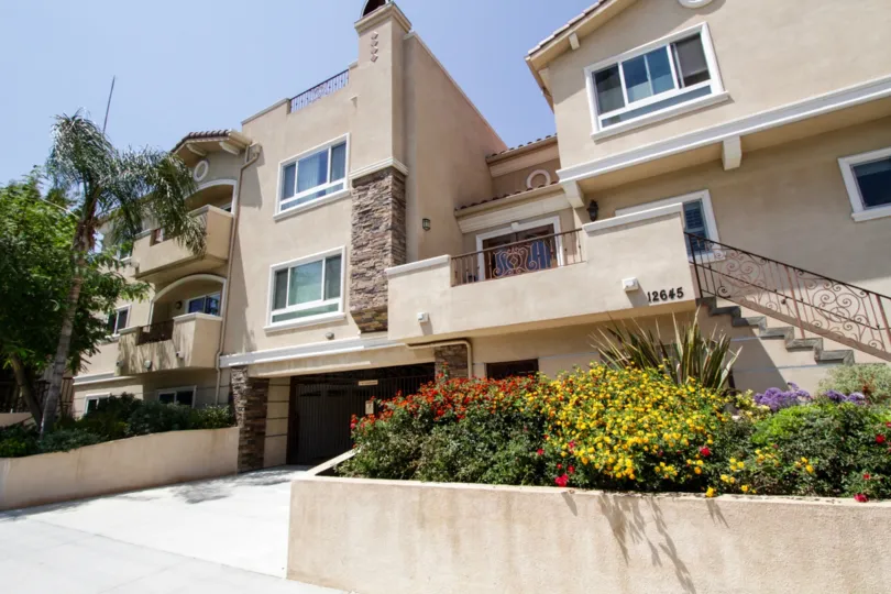 The view of Bellaire Townhouses from the sidewalk