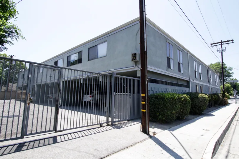 The gated entrance at Marlborough Palms in North Hollywood