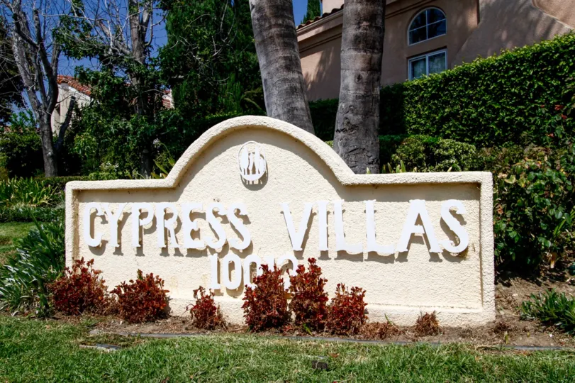 The sign welcoming you to Cypress Villas in Northridge CA