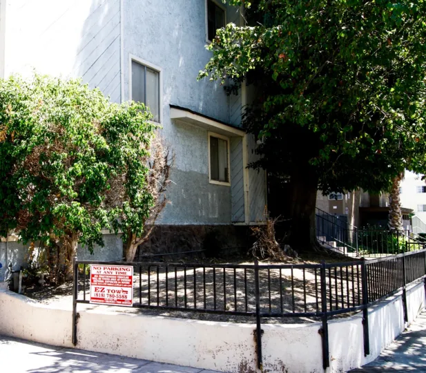 The curb in front of Willis Townhomes
