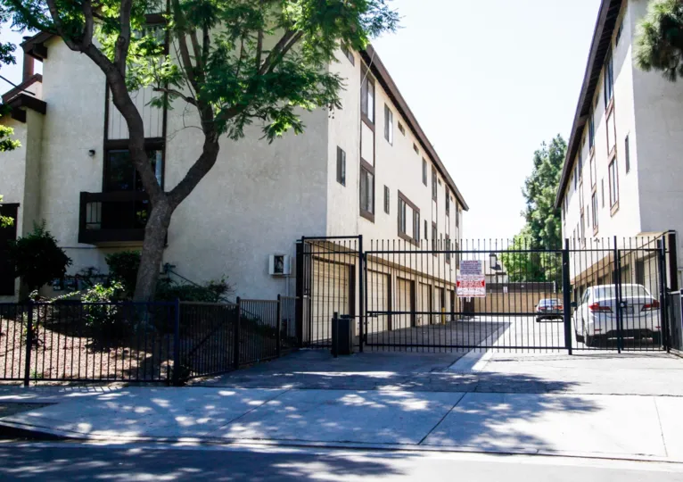 The gate into Woodman 36 for parking