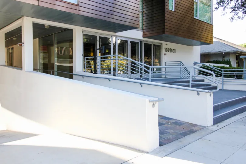 The walkway up to 141 S Hudson Ave