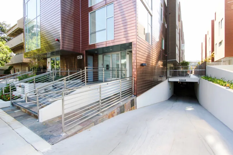 The ramp leading up to the entrance of 153 S Hudson Ave