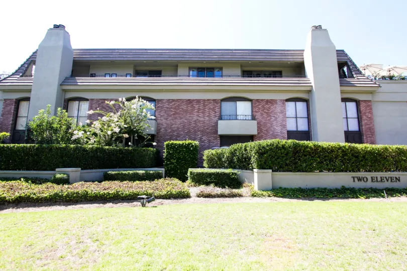 The arched windows of 211 S Orange Grove Blvd