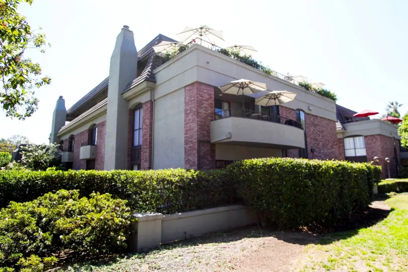 The balconies seen on the building at 211 S Orange Grove Blvd