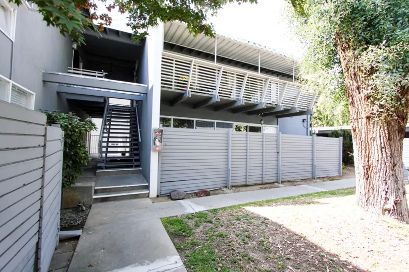 The privacy fence around units on the ground floor at 356 Cliff Dr