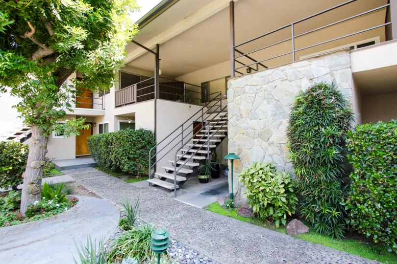 The stairs up to the second floor of 375 Cliff Dr
