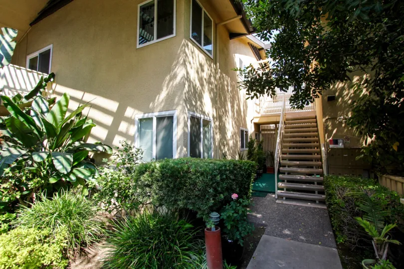 The stairs up to the second floor of 385 Cliff Dr