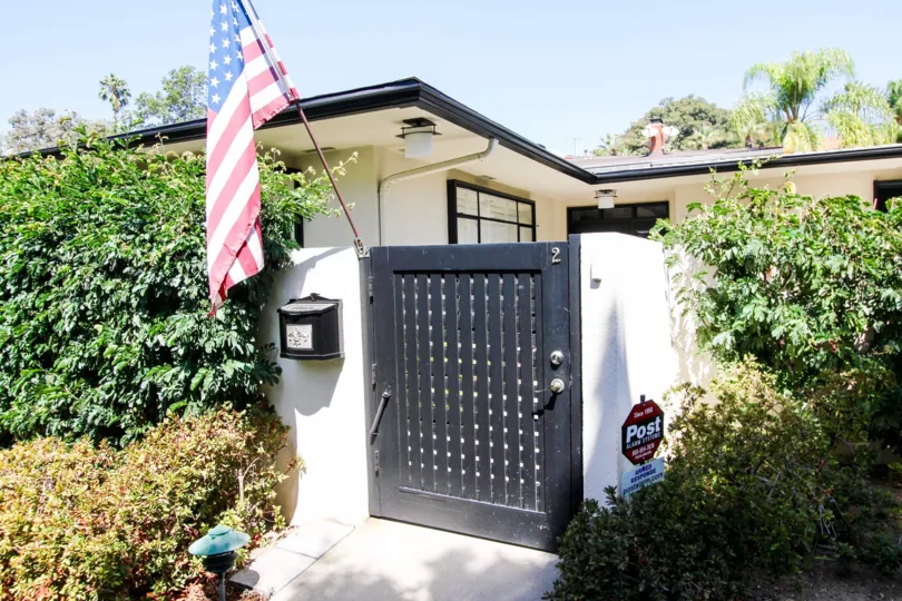 The side door into 481 S Orange Grove Blvd