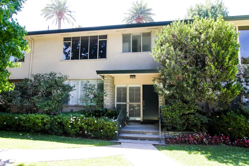 The yard in front of 660 S Orange Grove Blvd
