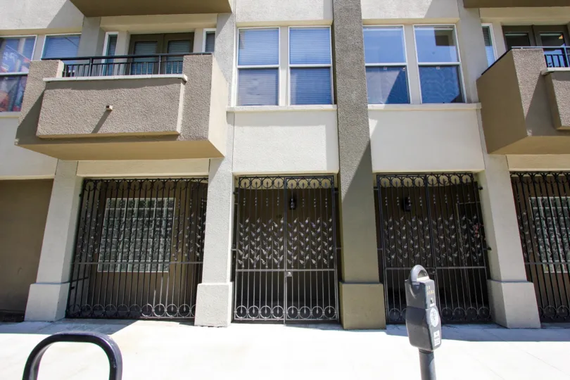 The gates on the bottom level of 80 North Raymond in Pasadena, California