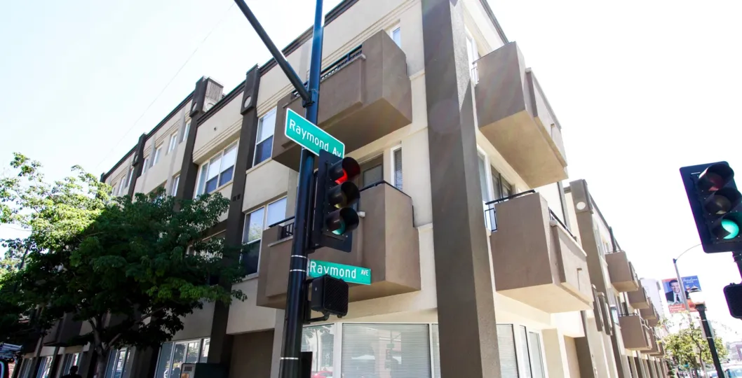 The street sign for 80 North Raymond