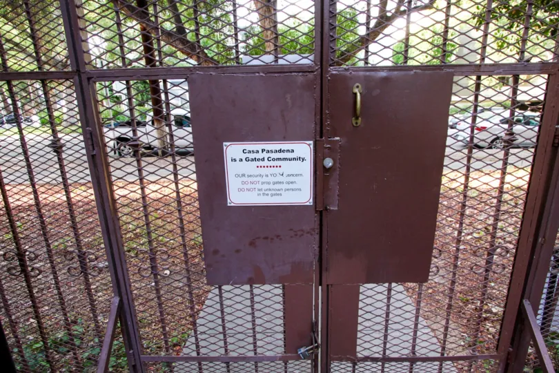 The locked gate to access Casa Pasadena