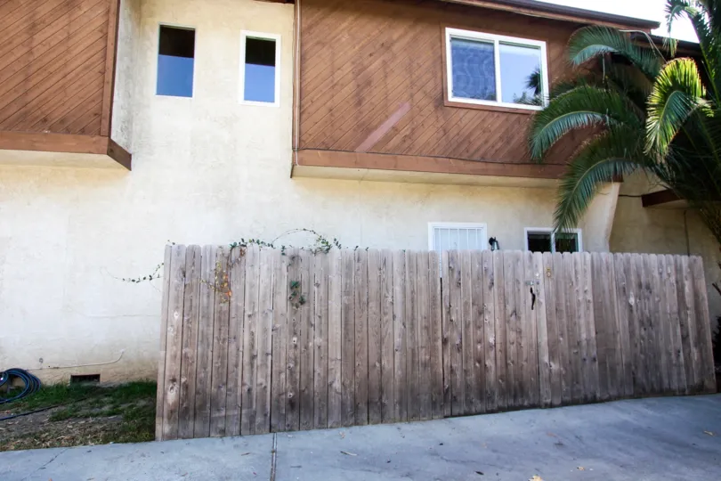 The privacy fence around Garfield Condominiums in Pasadena, California