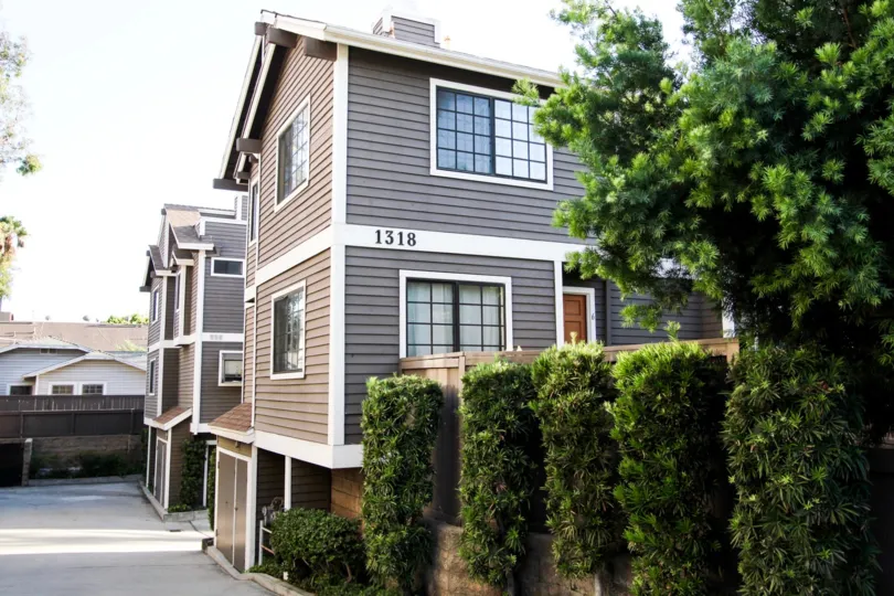 The address for Holliston Condominiums on the building