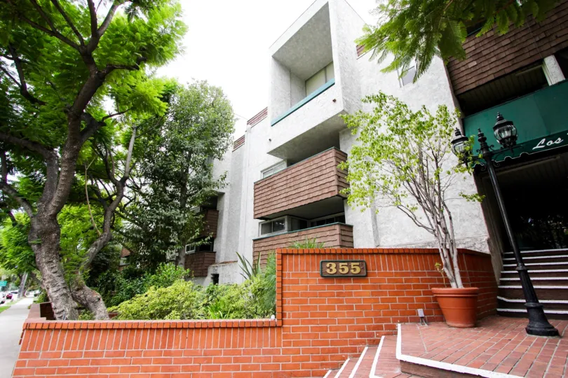 The address for Los Robles Plaza on the wall