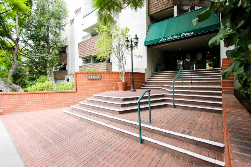 The stairs leading up to the entrance of Los Robles Plaza