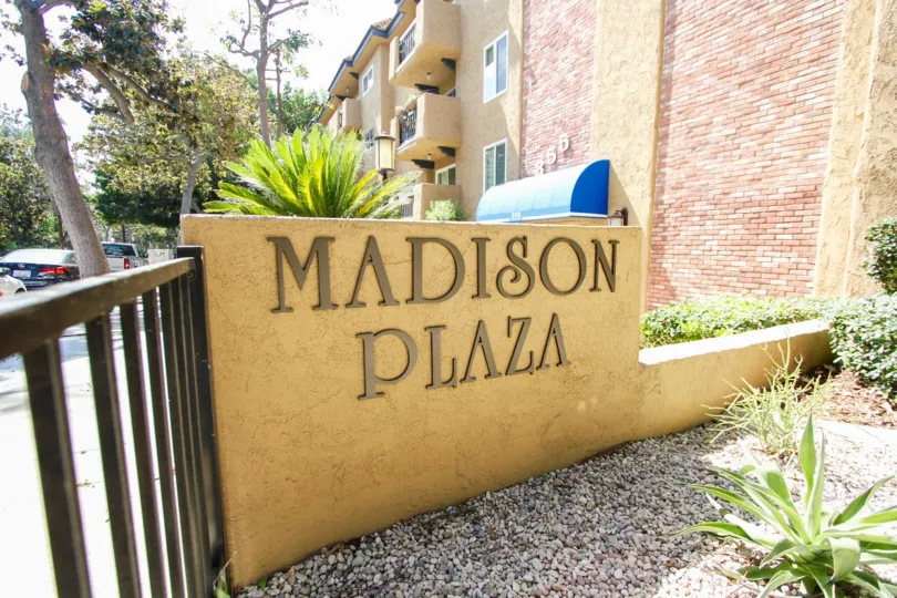 The sign announcing Madison Plaza in Pasadena, California