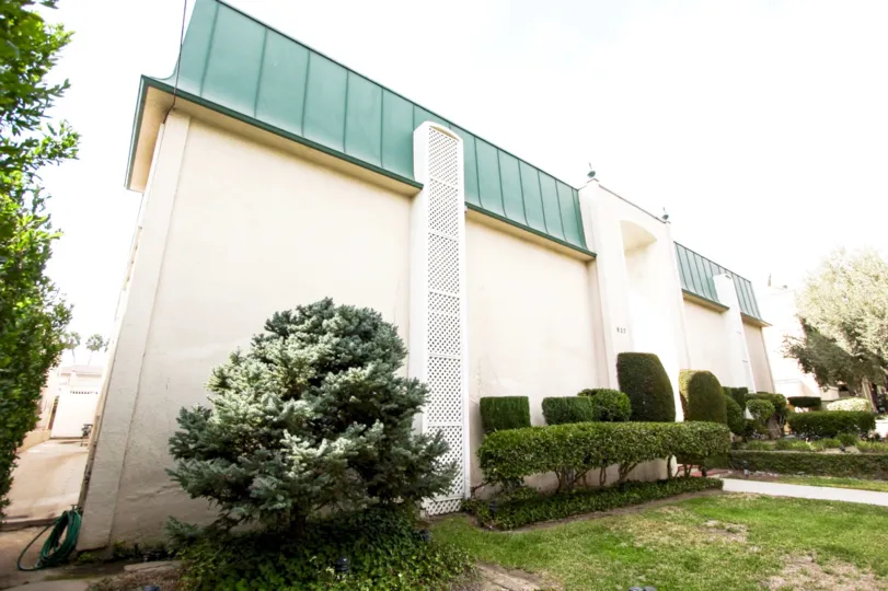 The hedges around the Magnolia Court building