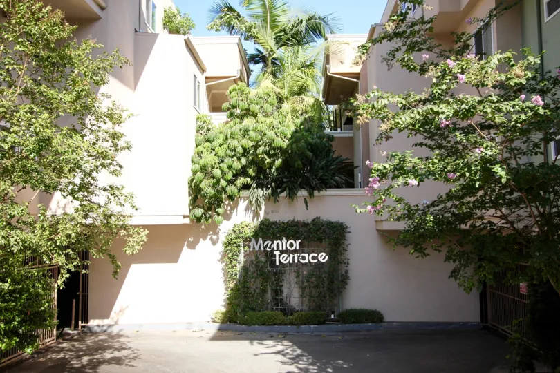 The Mentor Terrace sign seen on the building
