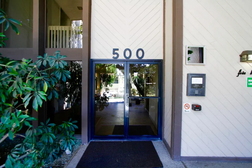The address for Parkwood Townhomes above the entrance