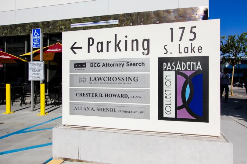 The sign for parking at Pasadena Collections East