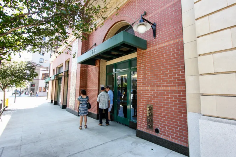 The covered entrance into Raymond Renaissance